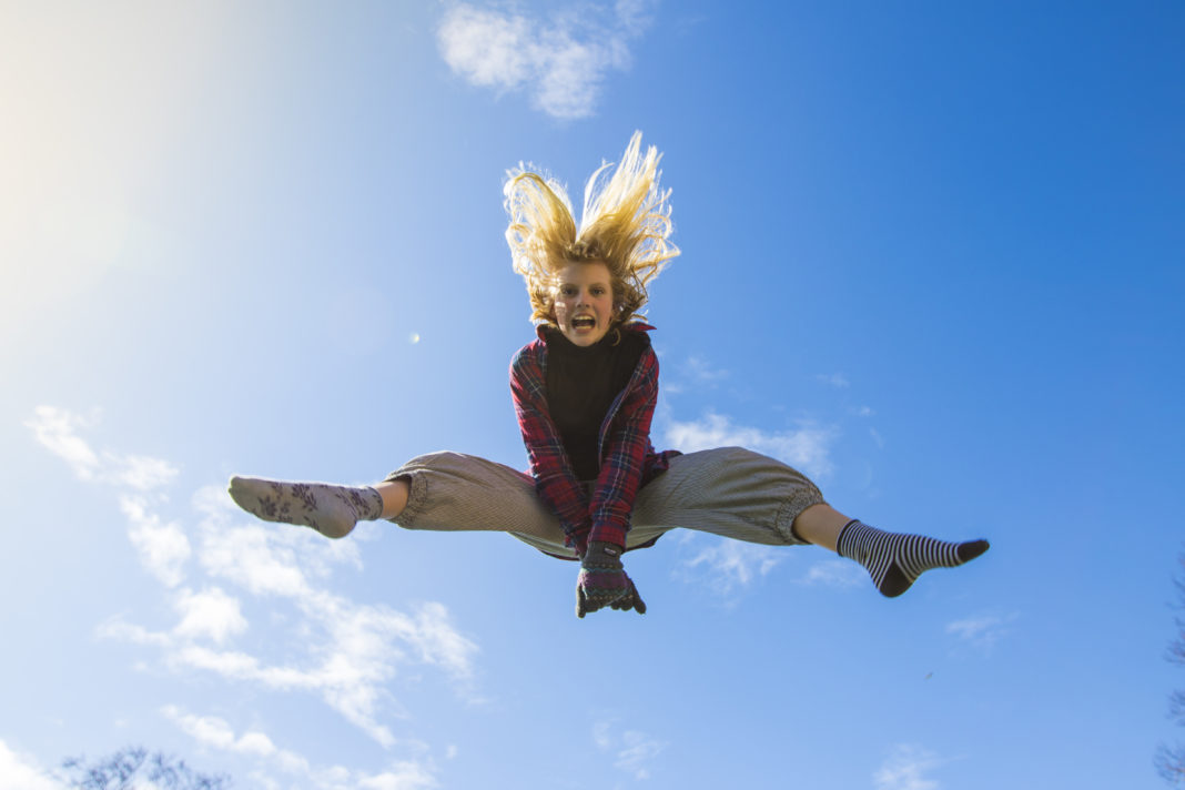 Girl jumping in the air