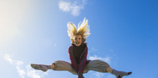 16 Ways to Boost Your Confidence Instantly Girl jumping in the air