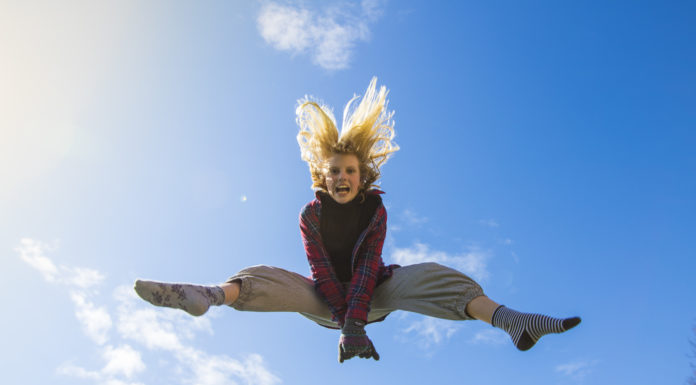 16 Ways to Boost Your Confidence Instantly Girl jumping in the air