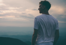 13 Ways To Be Mentally Stronger Today Man looking into the distance