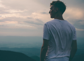 13 Ways To Be Mentally Stronger Today Man looking into the distance