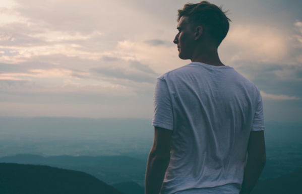 13 Ways To Be Mentally Stronger Today Man looking into the distance