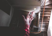 10 Misconceptions About Opportunity A man holding on to two die, signifying opportunity