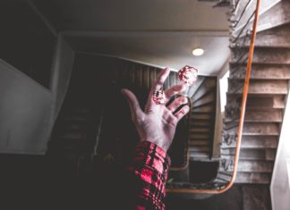 10 Misconceptions About Opportunity A man holding on to two die, signifying opportunity