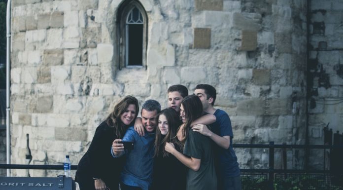 How To Manage Your Social Life Effectively! a group of friends taking a picture