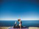 Meditation: A Guide to Mindfulness Woman doing yoga by the sea side