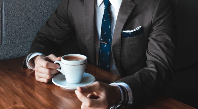 10 Secrets Of Absolutely Irresistible People Man in a tuxedo, drinking coffee