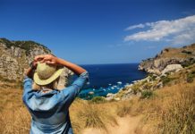 6 Ways To Make The Most Of Your Vacations Lady looking at the ocean, while her vacations