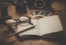 Scores Or The Curiosity to Learn: What To Build Upon? A notebook and a pair of glasses