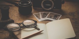 Scores Or The Curiosity to Learn: What To Build Upon? A notebook and a pair of glasses