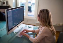 7 Things You Need To Know When You Start Your First Job Woman working on her first job