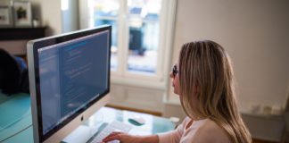 7 Things You Need To Know When You Start Your First Job Woman working on her first job